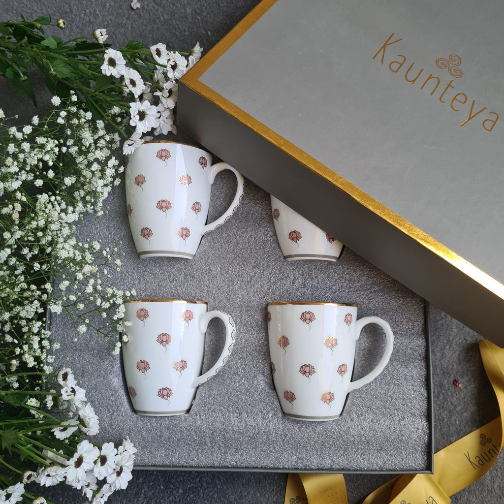Kaunteya Pichwai Premium Gift Set- Lightweight, fine bone china, tableware, luxury 4 coffee mugs, gift box, 24K gold plated, beautiful gold and white crockery with intricately designed pink lotuses.