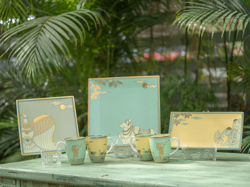 Kaunteya Airavata Premium Coffee Set- Lightweight, fine bone china, tableware, luxury coffee set, yellow, 9  piecces, 24K gold plated, Pattachitra art, beautiful gold and yellow crockery with intricate designs. 